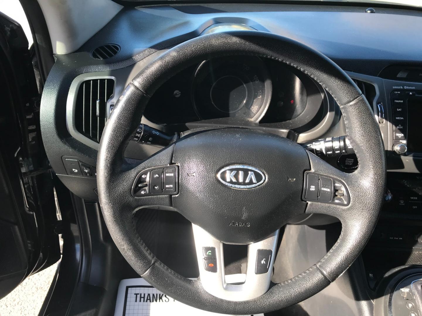 2012 Black /Black Kia Sportage EX (KNDPCCA62C7) with an 2.0 V4 engine, Automatic transmission, located at 577 Chester Pike, Prospect Park, PA, 19076, (610) 237-1015, 39.886154, -75.302338 - Photo#11